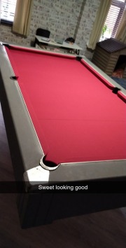 Customers table in burgundy cloth